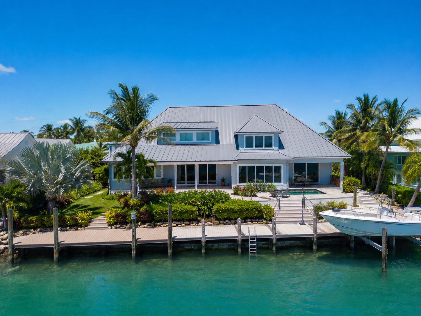 Standing seam over a canal-front home in Tavernier · MM 92