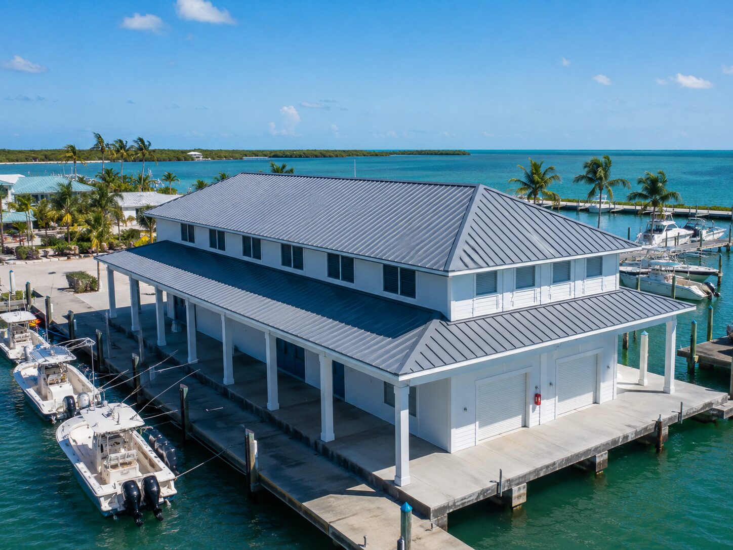 Hurricane-rated standing seam, waterfront in Rock Harbor · MM 98